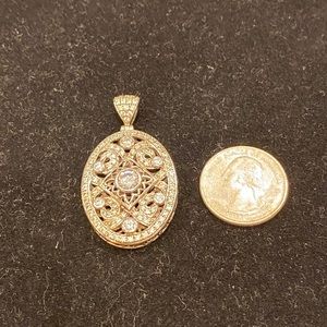 Large, oval CZ and sterling silver pendant